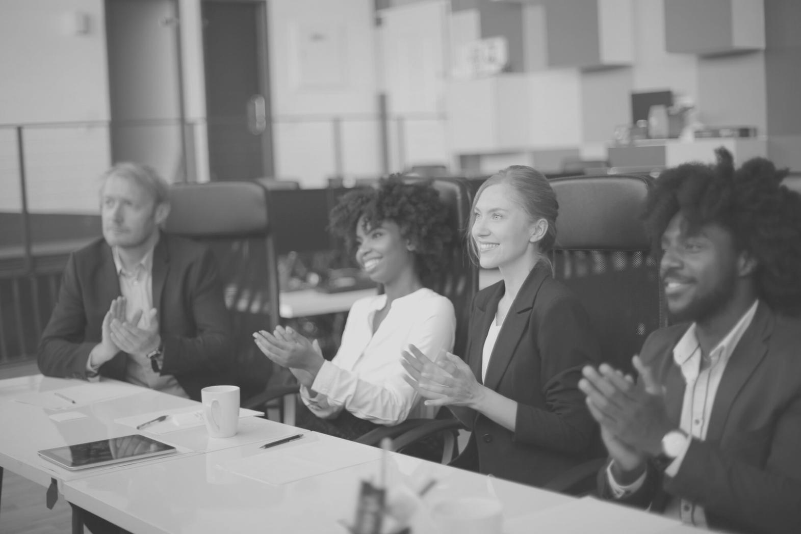 Team collaboration session reviewing financial reports and analysis results